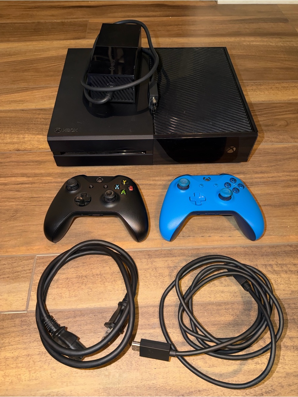 Microsoft Xbox One Console with Black and Blue Wireless Controllers